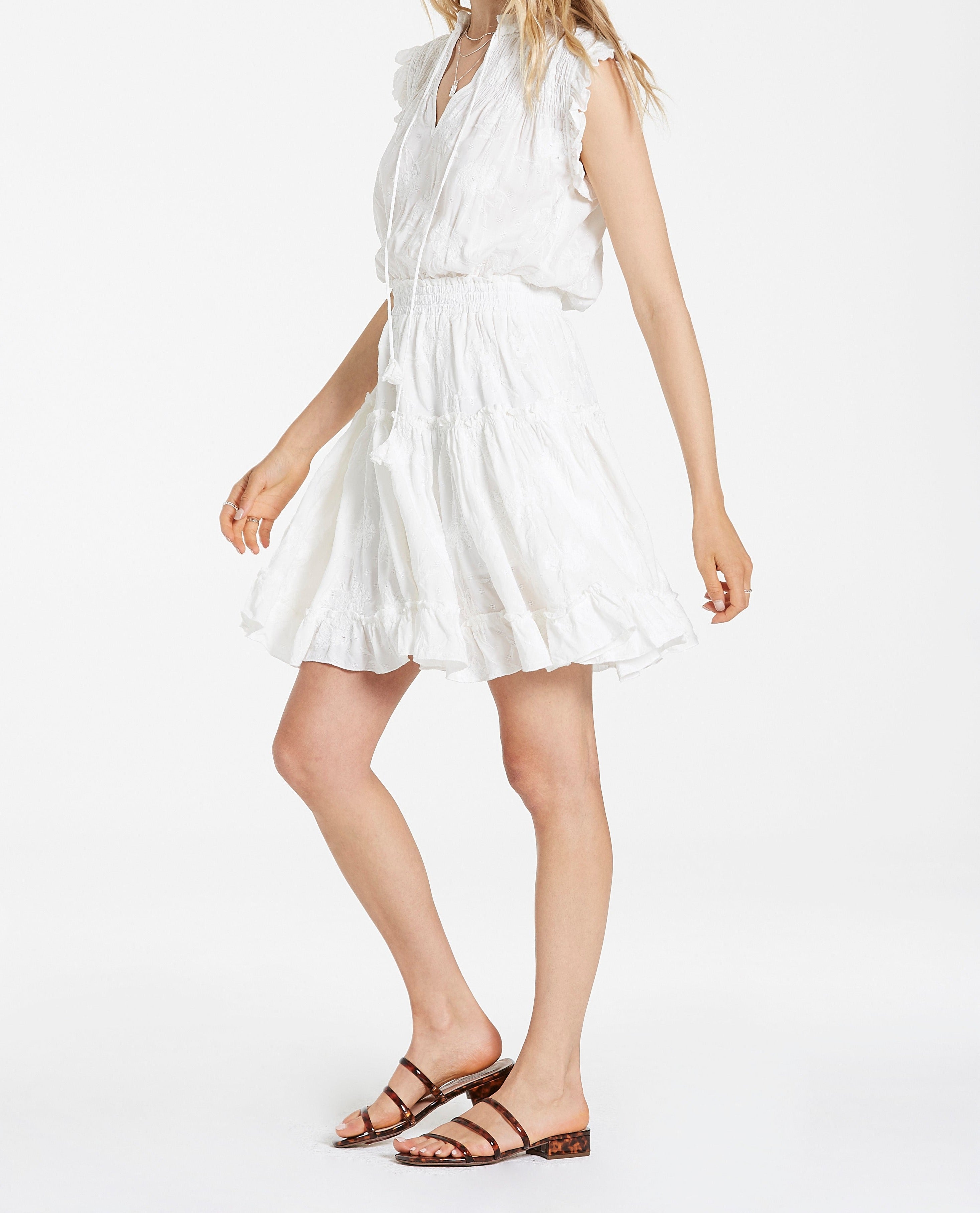 image of a female model wearing a MELODIE TIERED RUFFLE PEARLED IVORY FLORAL DRESS DEAR JOHN DENIM 
